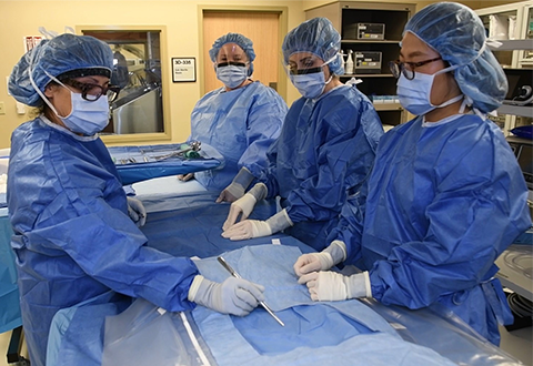 image of a group of Nurses in an operating room.