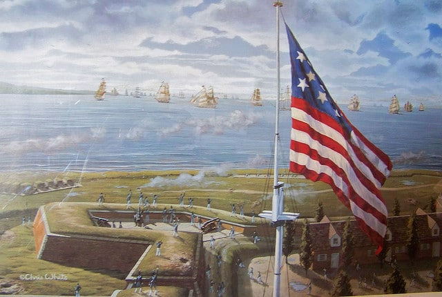 Paingtin of an American Flag flying over Fort McHenry at the beginning of the bombardment.