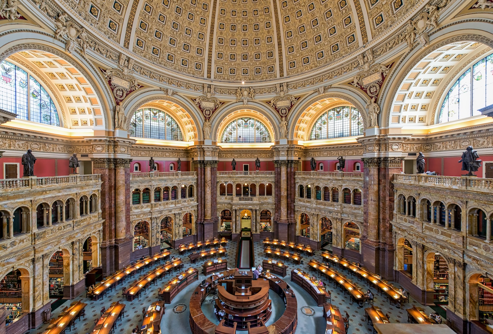 Library of Congress - a large ornate building with many arches and thousands of books