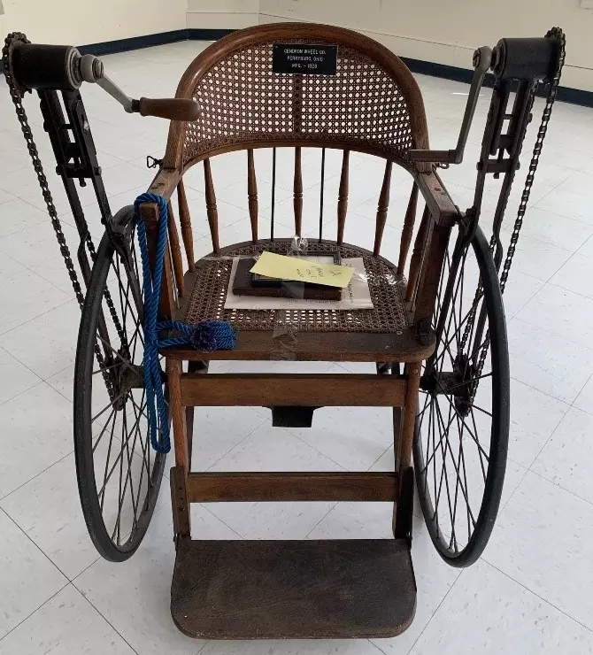 Wheelchair from the Mountain Home collection. Manufactured in 1928 at Gendron Wheel Co. in Petersburg, Ohio. (NVAHC)