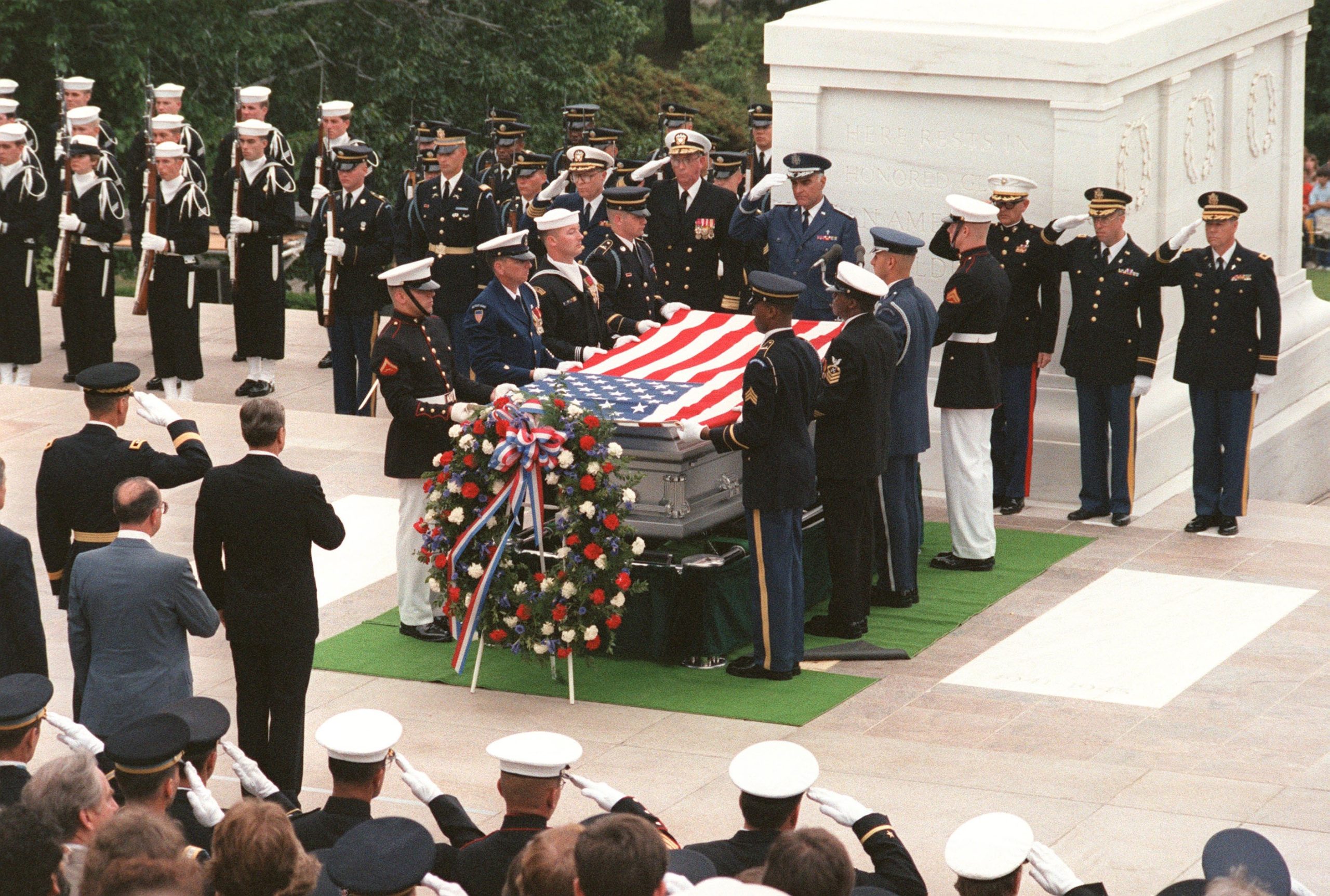 Interment ceremony for Vietnam Unknown at the Tomb of the Unknown Soldier, with President Ronald Reagan presiding, May 28, 1984. Testing later identified the Unknown as Air Force pilot Michael Blassie. (National Archives)