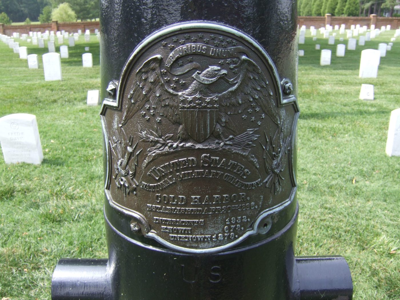 Civil War bronze shield on inverted cannon at Cold Harbor National Cemetery, Virginia. (NCA)