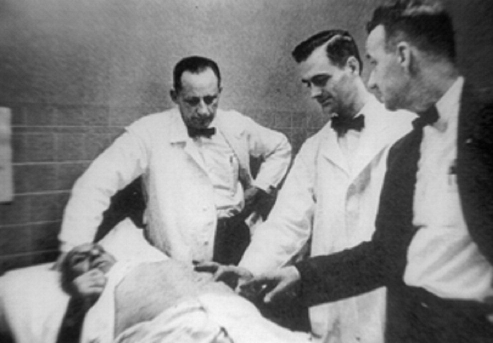 Dr. Chardack and his team meet with one of the first patients to receive the implantable cardiac pacemaker. (American Journal of Cardiology)