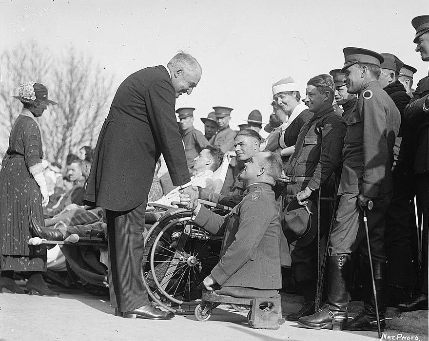 President Warren Harding greeting disabled soldiers at Walter Reed Hospital in Washington, D.C., in 1921. Walter Reed was one of the few Army general hospitals that remained open after World War I. (Library of Congress)