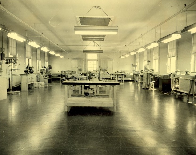 Photo of the machine shop at the Hines Center, c. 1951. The center’s curriculum emphasized Orientation and Mobility training but it also included time for wood and metal work and other therapeutic activities. (Museum of the American Printing House for the Blind).