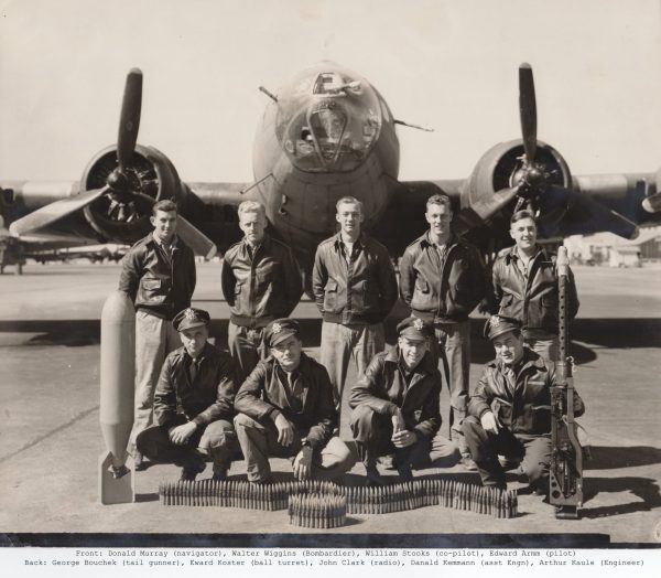 The crew of B-17 number 662 (aircraft name unknown), including John Clark, standing in the middle of the back row. (VA)