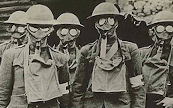 World War I soldiers with gas masks.