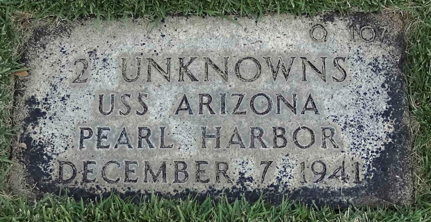 A grave marker at the National Cemetery of the Pacific for two unknowns who died aboard USS Arizona during the December 7, 1941, surprise attack on Pearl Harbor. (VA) 