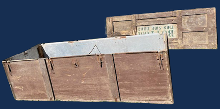 The casket case used to transport the remains of Pvt. Andrew Vadasz back to the United States. Note that the “lid” says “This side down”, meaning that the body of the case would have been placed on top of the platform while in-use (VA).