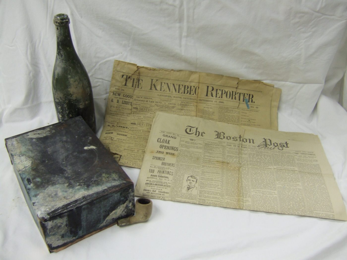 Time capsule, with newspapers dated September 15, 1889, and other objects found in National Cemetery monument. (NCA)