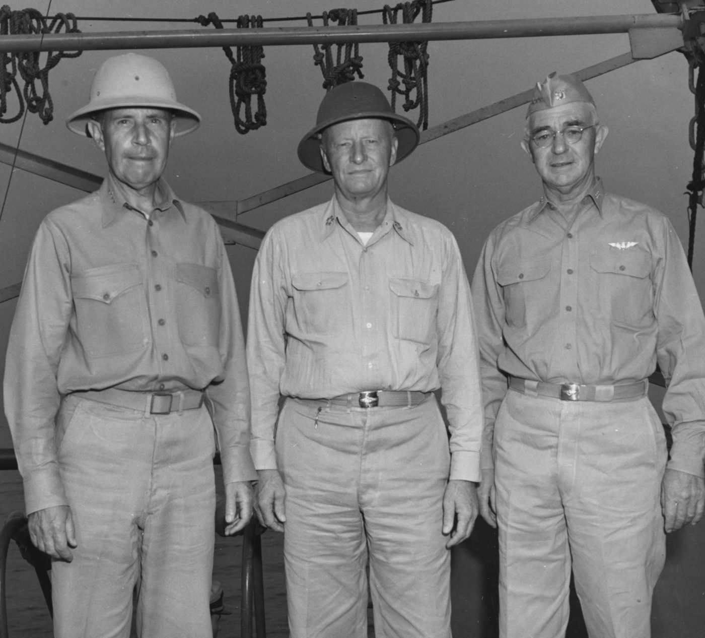 Pictured left to right: Admirals Raymond A. Spruance, Chester W. Nimitz, and Richmond Kelly Turner on board a ship off Okinawa, 1945. (National Archives)