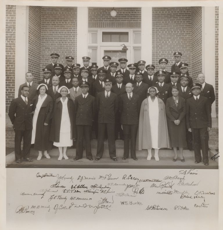 Chief Nurse Esther Bullock and her team of nurses at the Tuskegee Veterans Administration Hospital, 1933. Includes 36 individuals standing on the steps of a building. (National Archives)