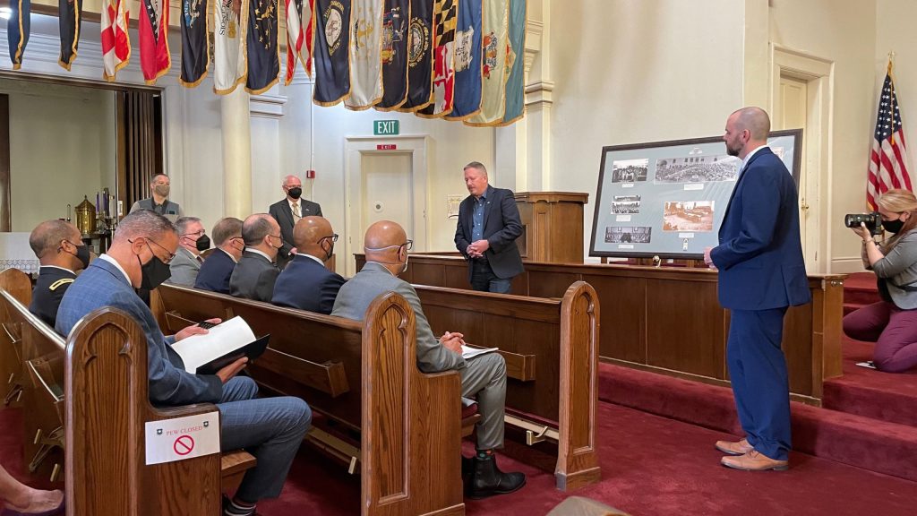 Historians present Houston Riots story to audience in Gift Chapel, location of court-martials: John Haymond (left, facing audience) and NCA’s Richard Hulver (far right). (U.S. Army)