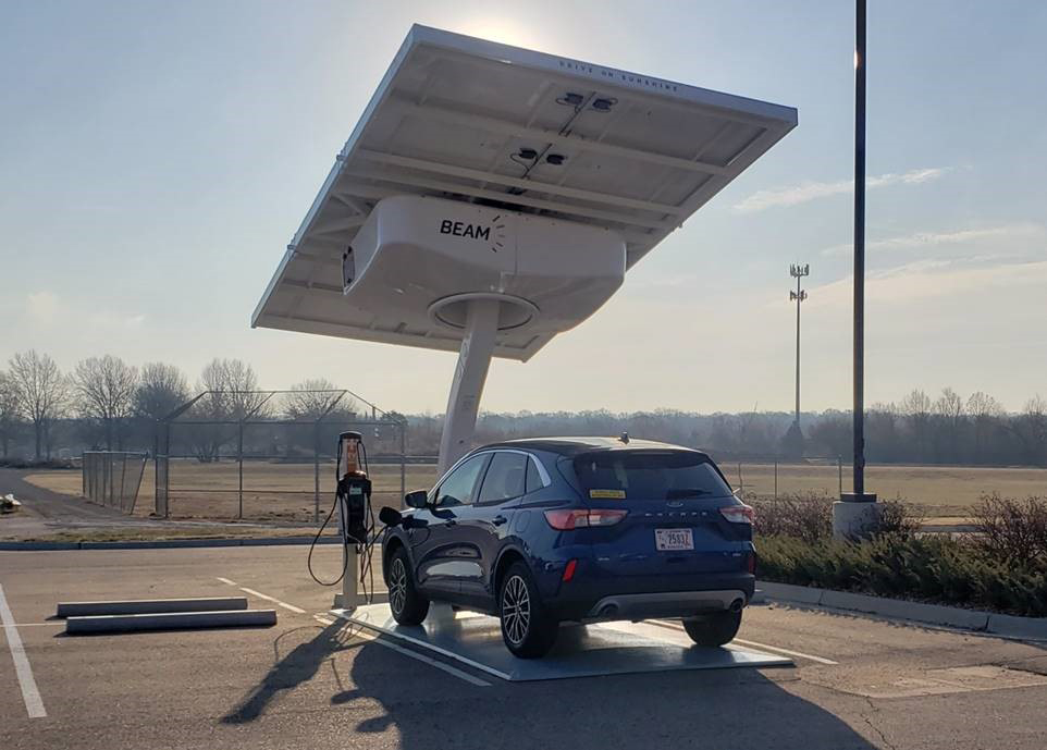 VA vehicle being charged through a solar-powered charger at the VA Medical Center in Topeka, Kans.